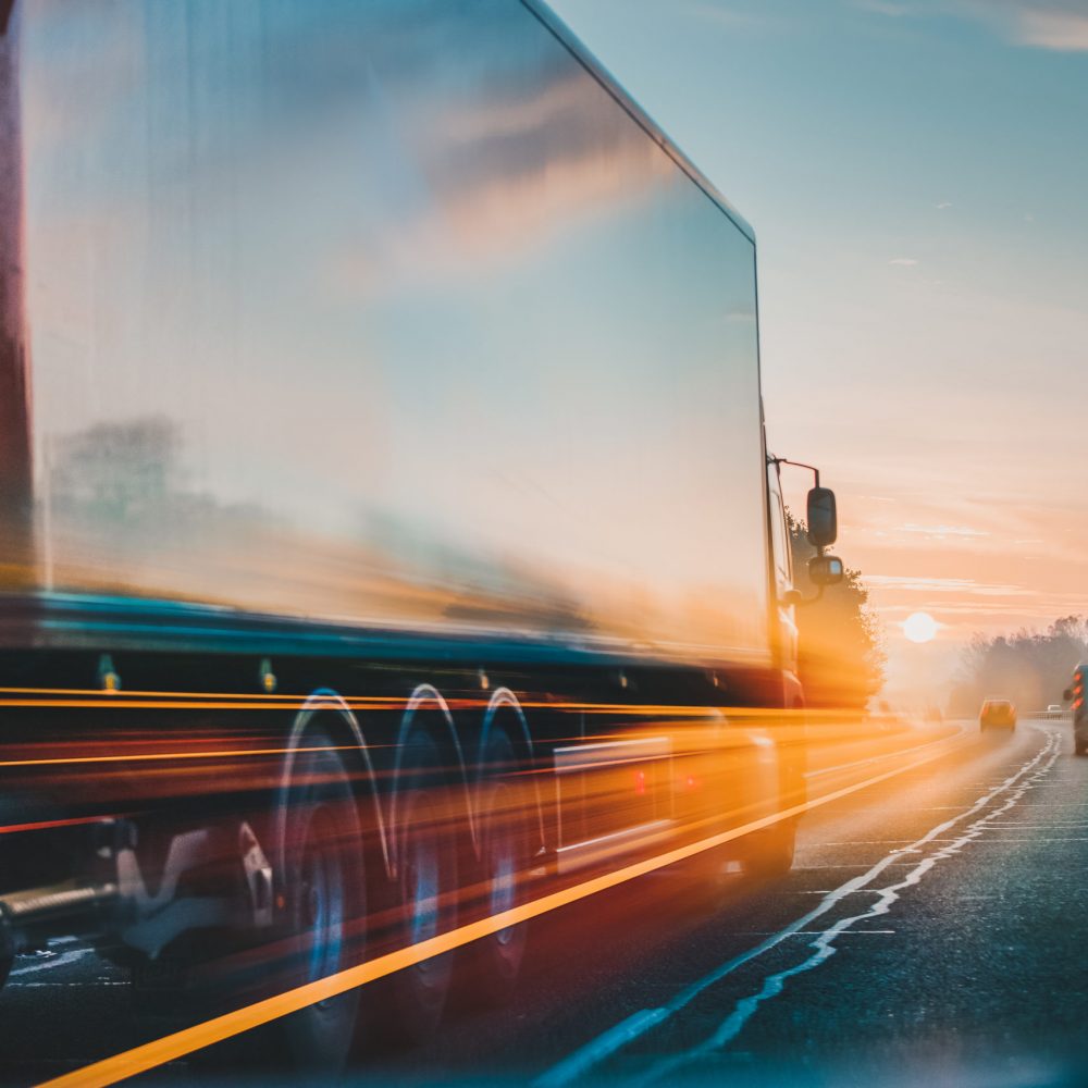 Red Lorry on M1 motorway in motion near London